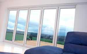 White upvc bifold door with double glazing Lancashire