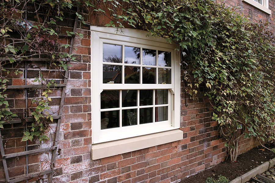 Cream UPVC vertical sliding window