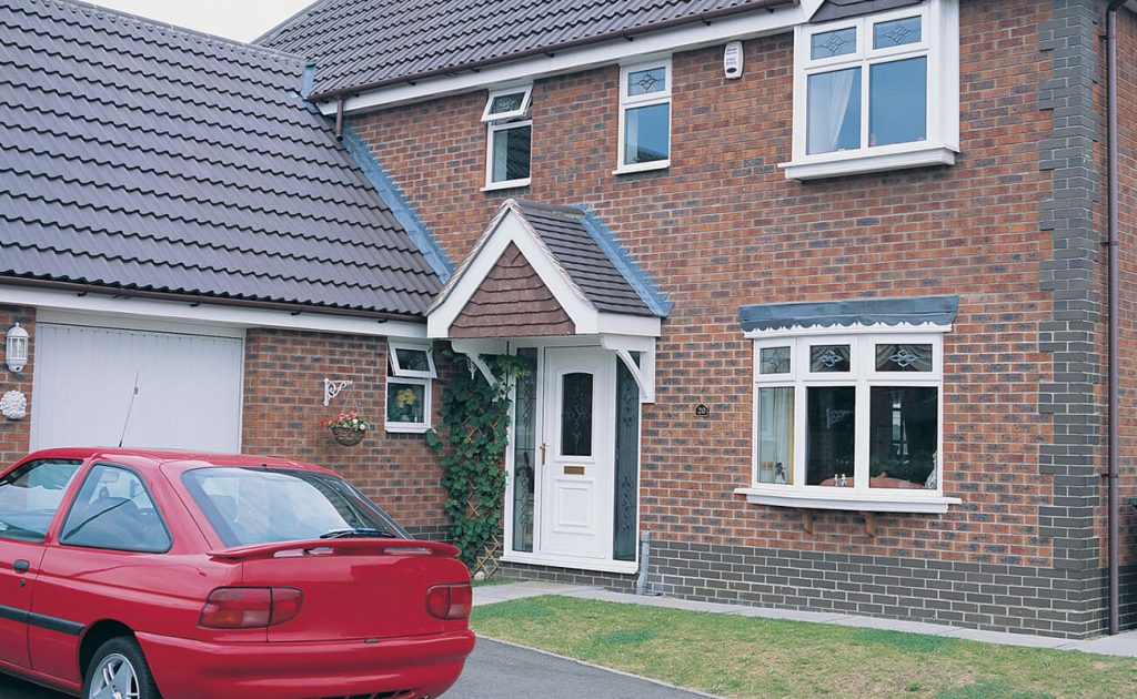 Brick house with solid roof and garage