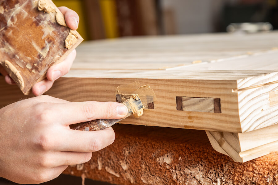 Close-up of wood glue applied during assembly of Accoya timber products at Great Harwood Windows